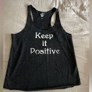 Two positive tank tops